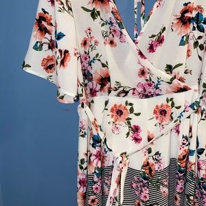 Floral and black & white striped romper!